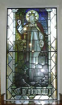 One of the old stained glass windows from the original church.